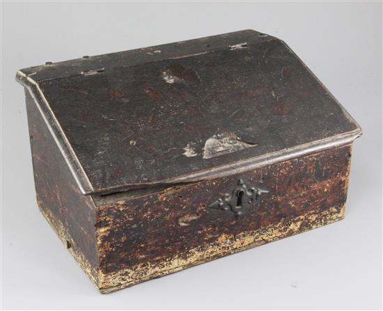 A 17th century oak and pine lap desk, W.1ft. D.7.5in. H.6.75in., initialled IP